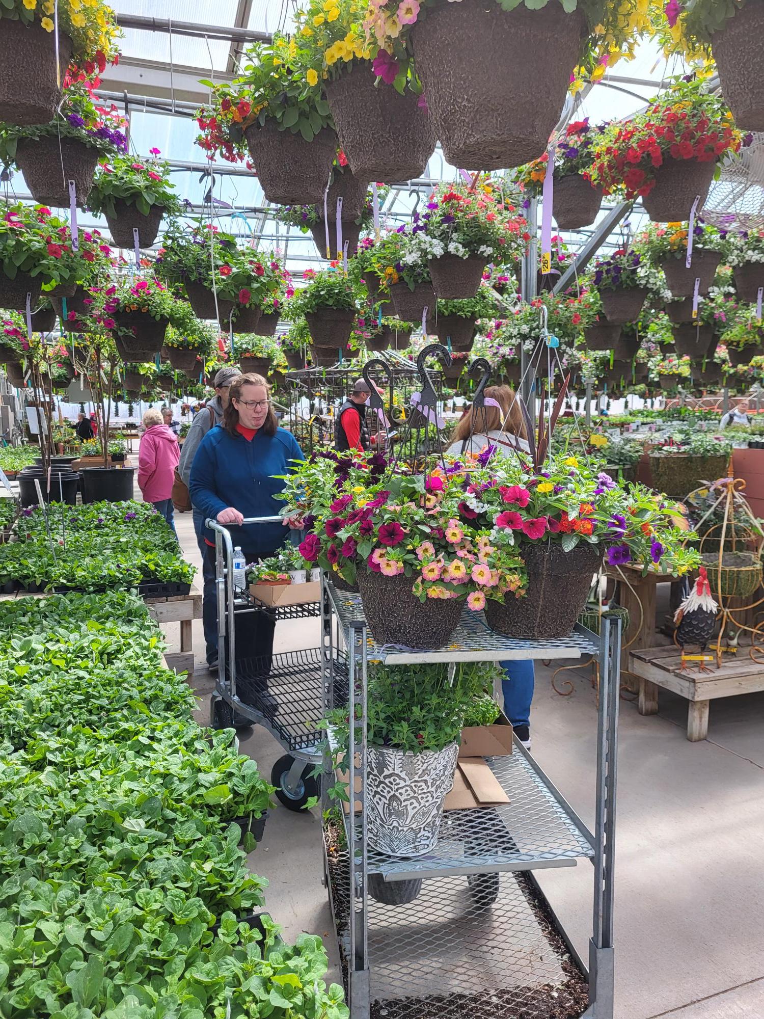 Woman shopping in Diane's Greenhouse