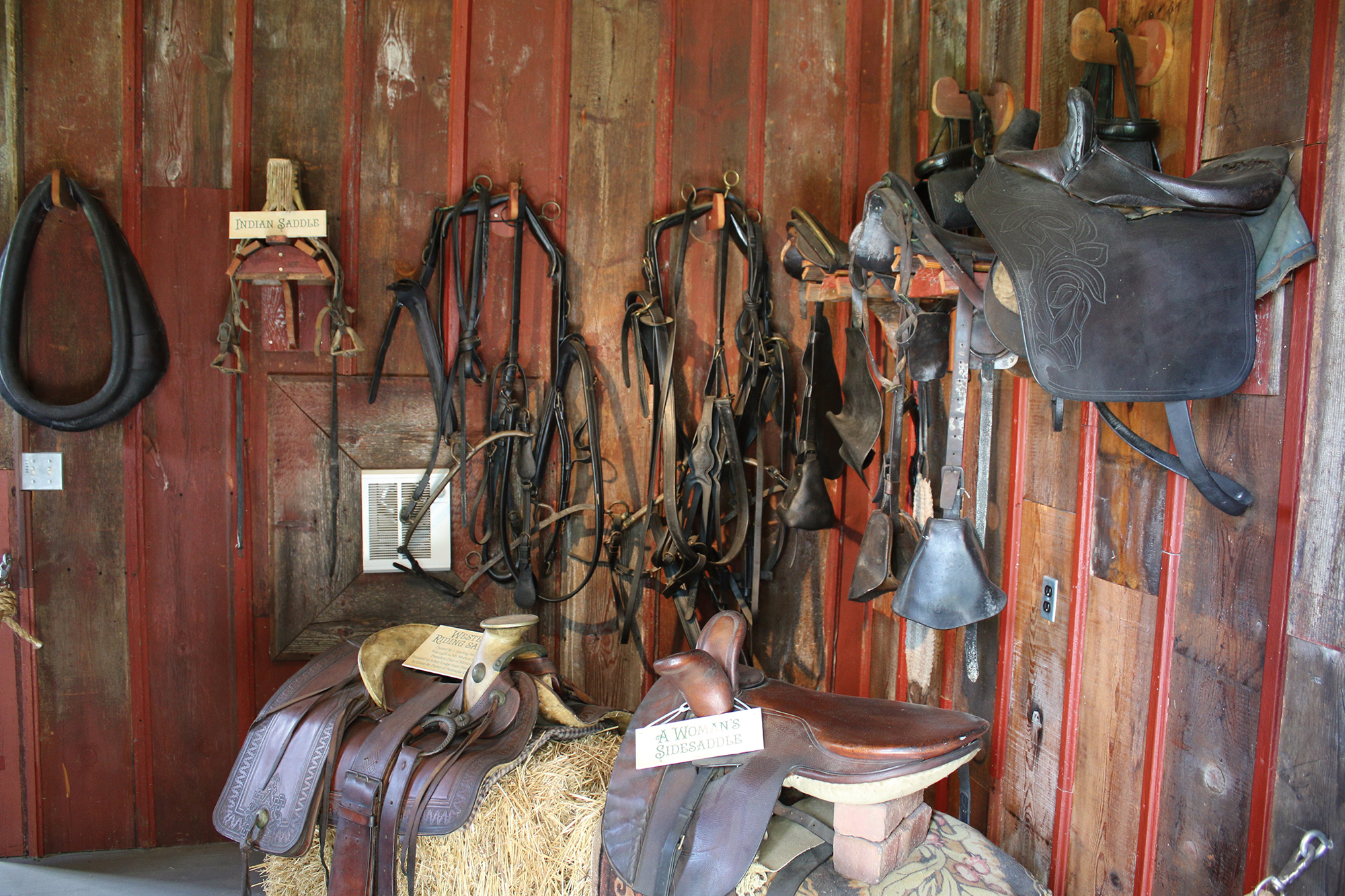 Saddles and ranch tools at Arbor Lodge State Historical Park.