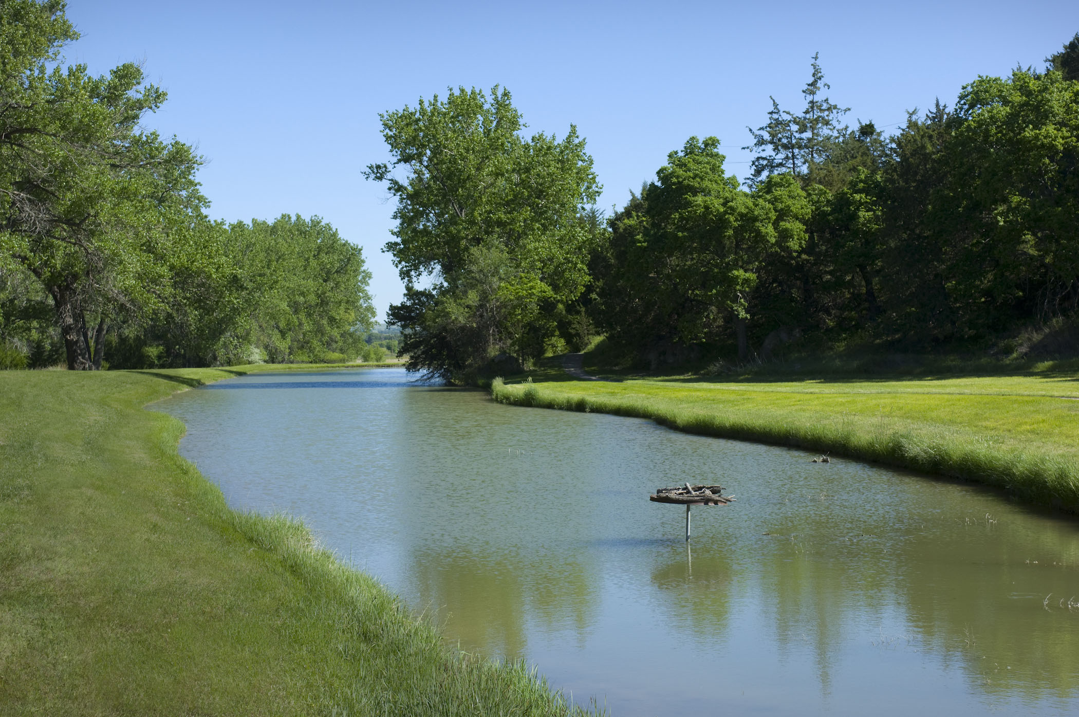 Trees on each side of a river or creek at Ash Hollow State Historical Park