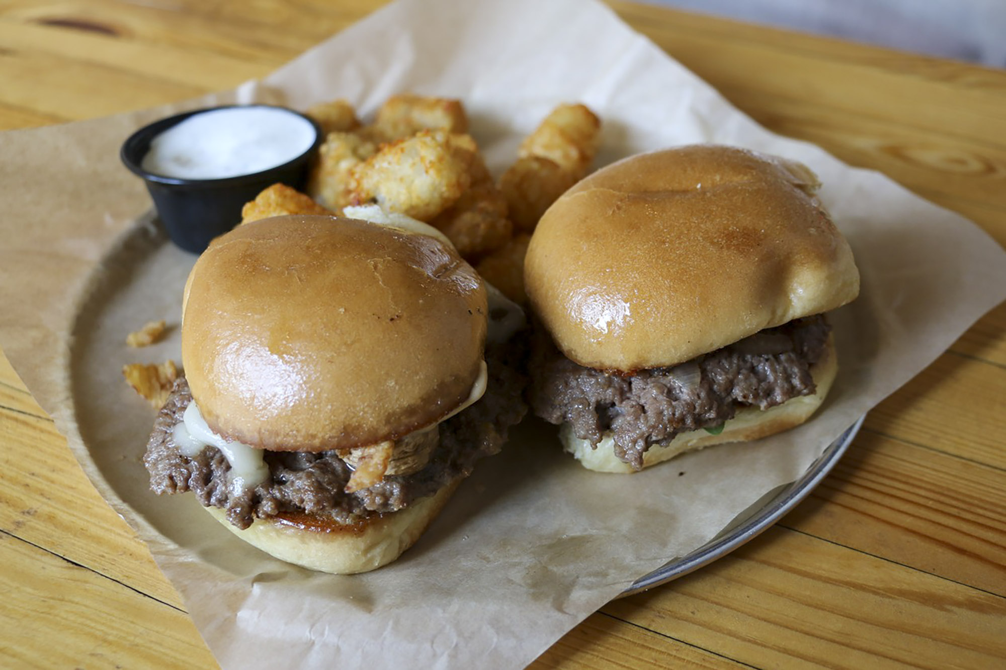 A plate of sliders from Craft Sliders + Beer