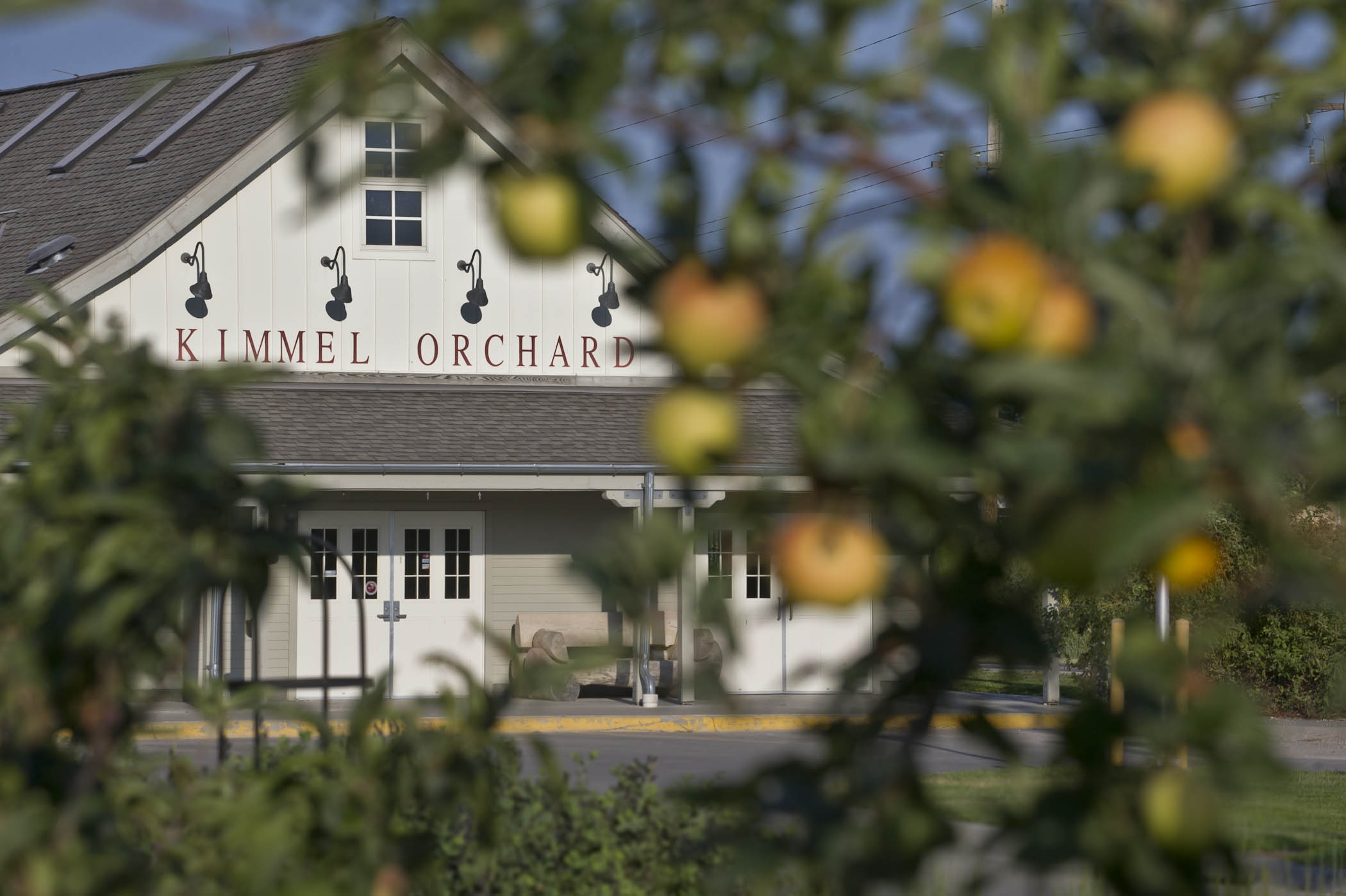 Kimmel Orchard Barn seen through apple trees in Nebraska City.