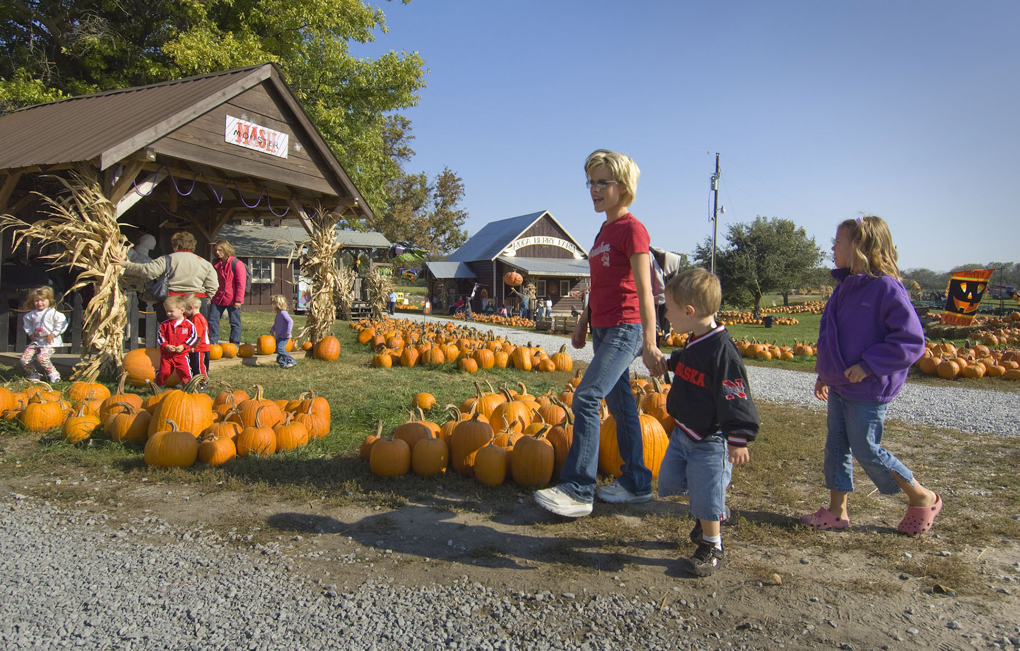 Family exploring the pumpkin patch at Roca Berry Farm. | Rick Neibel / Nebraska Tourism