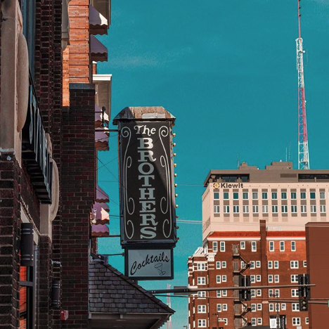 restaurant sign and skyline