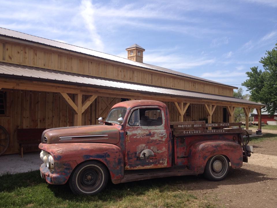 Old truck and farm building at Harvest Moon Pumpkin Patch.