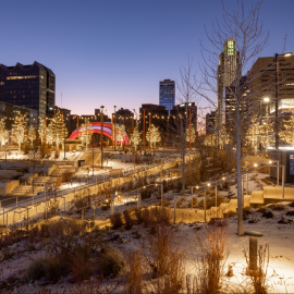 Christmas lights decorate the trees surrounding The RiverFront in Omaha.