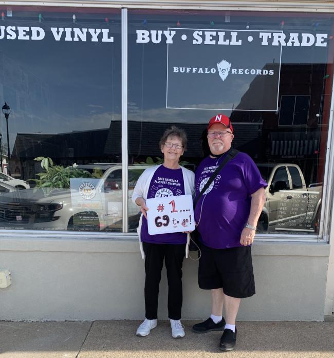 Couple infront of record shop